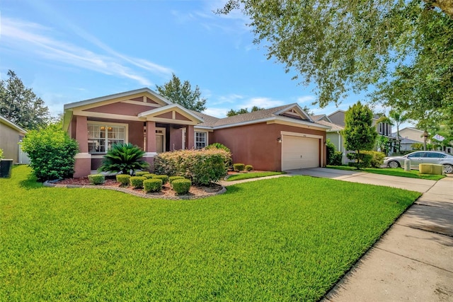 craftsman-style house with a garage and a front lawn