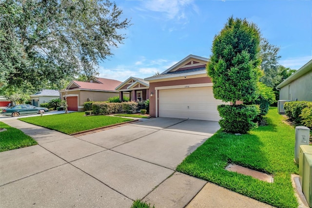 ranch-style house featuring cooling unit, a garage, and a front yard