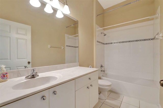 full bathroom with washtub / shower combination, tile patterned flooring, vanity, and toilet