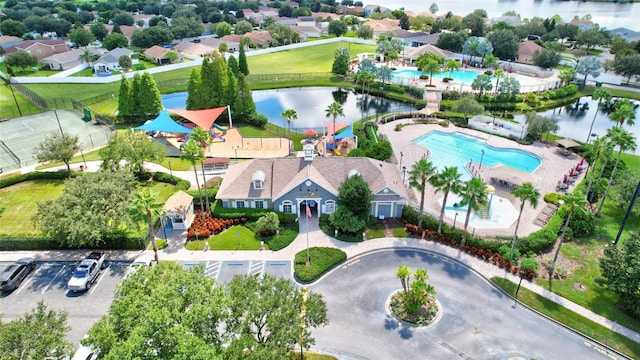 drone / aerial view with a water view