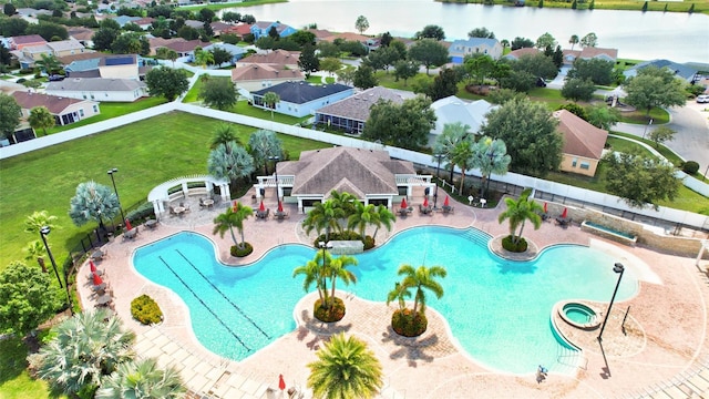 view of pool with a water view