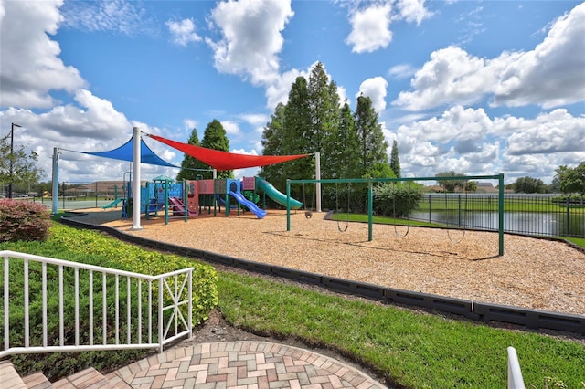 view of playground featuring a water view