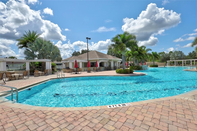 view of pool featuring a patio