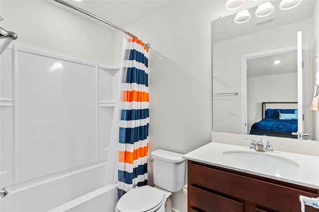 full bathroom featuring vanity, toilet, and shower / bath combo with shower curtain