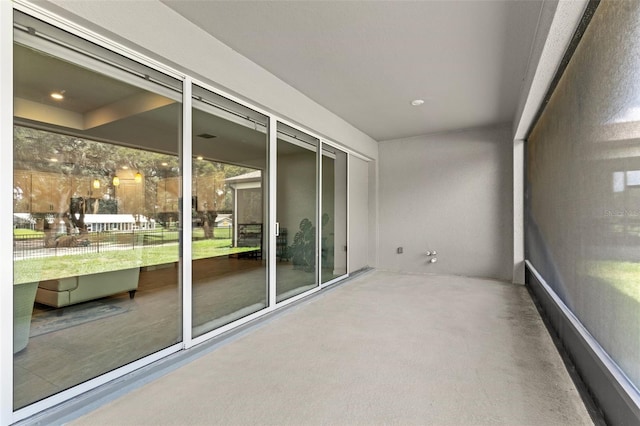 unfurnished sunroom with a wealth of natural light