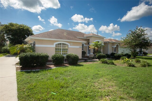 view of front of home with a front lawn