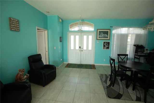 foyer with tile patterned floors