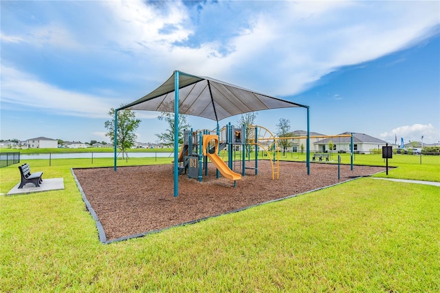 view of playground featuring a lawn