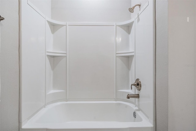 bathroom with shower / bath combination