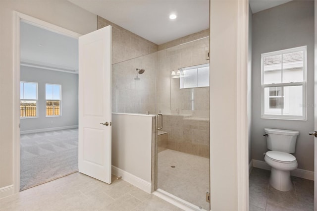 10426 Longmeadow Ave, Parrish, FL 34219 - full bathroom featuring a shower stall, baseboards, toilet, tile patterned flooring, and recessed lighting