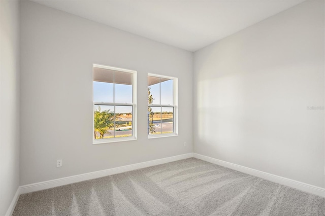 10426 Longmeadow Ave, Parrish, FL 34219 - unfurnished room featuring carpet floors and baseboards