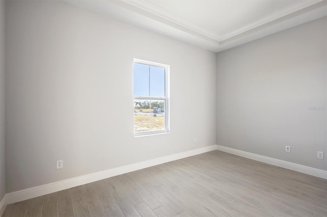 spare room featuring light hardwood / wood-style floors