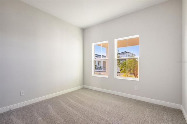 10324 Longmeadow Ave, Parrish, FL 34219 - spare room with carpet and baseboards