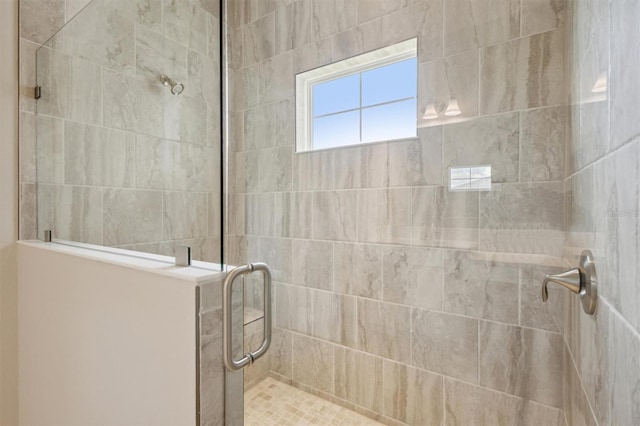 bathroom featuring walk in shower