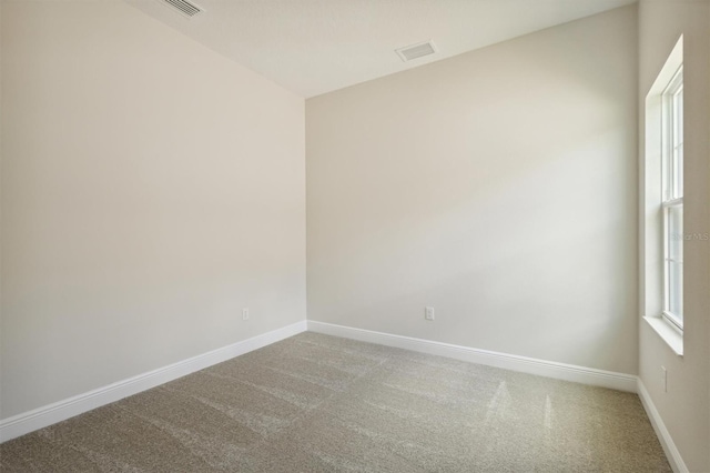 empty room featuring carpet