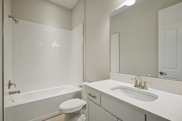 full bathroom with wood-type flooring, toilet, tub / shower combination, and vanity