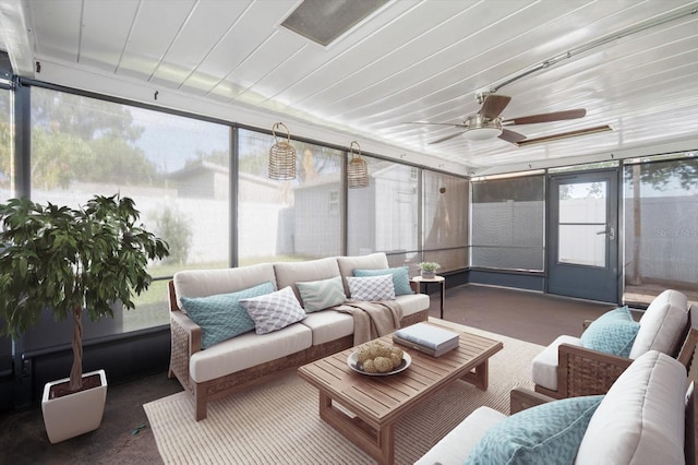 sunroom / solarium with ceiling fan