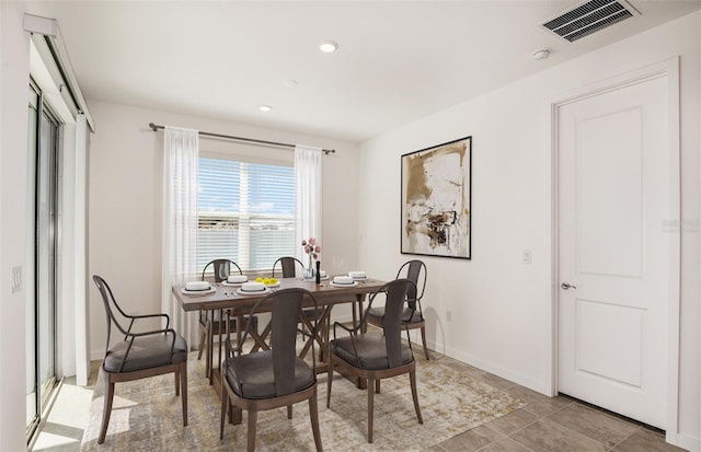 view of tiled dining space