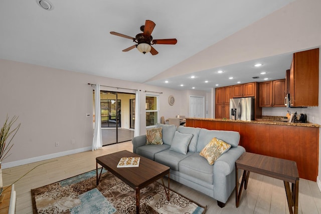 2618 Crestfield Dr, Valrico, FL 33596 - living area featuring ceiling fan, baseboards, light wood-type flooring, recessed lighting, and high vaulted ceiling