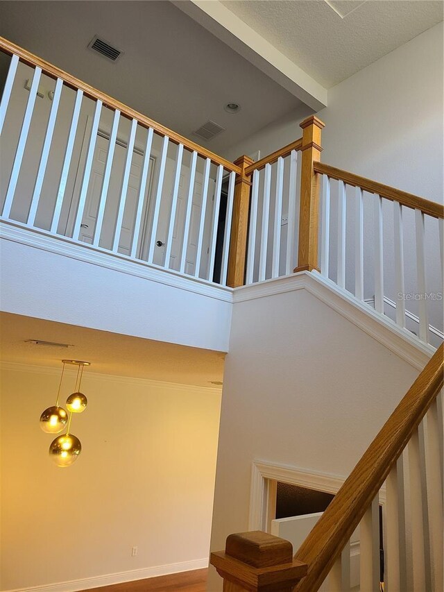 stairs with a towering ceiling