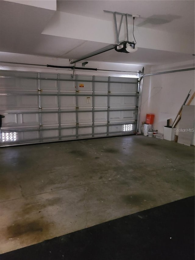 garage featuring a garage door opener