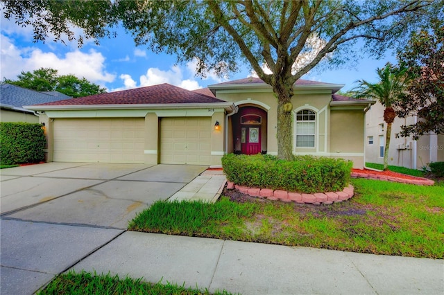 view of front of home featuring a garage