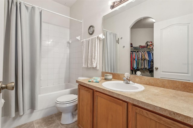 full bathroom with vanity, tile patterned flooring, toilet, and shower / bath combo with shower curtain