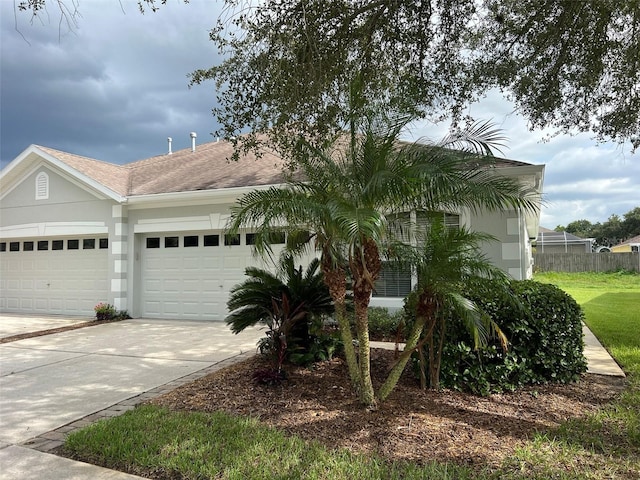 view of front of property with a garage