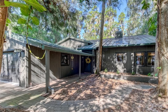 17210 Orangewood Dr, Lutz, FL 33548 - back of property featuring a garage