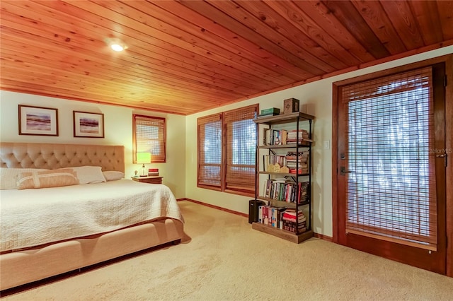 carpeted bedroom with wooden ceiling