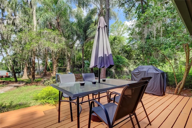 wooden deck with area for grilling