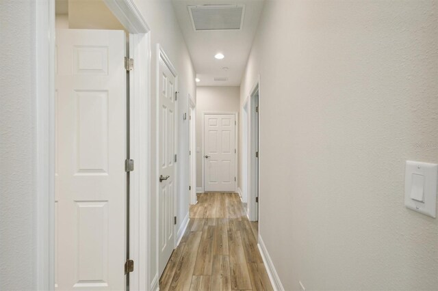 hall featuring light hardwood / wood-style floors