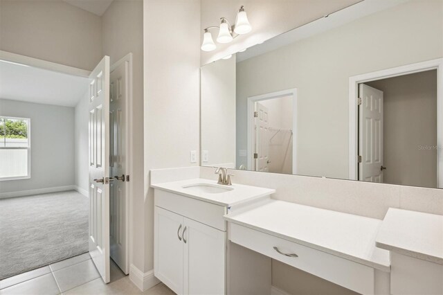 bathroom with vanity and tile patterned flooring