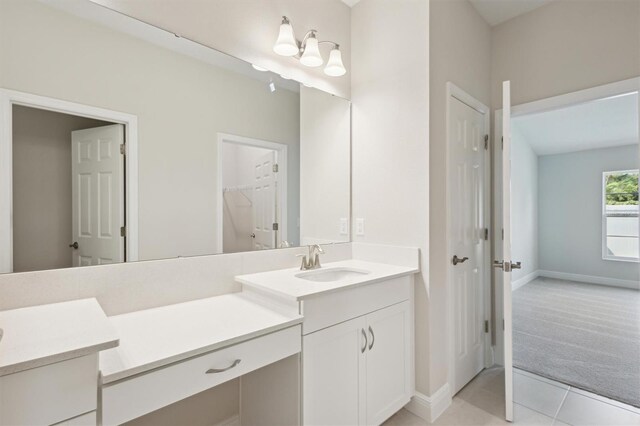 bathroom featuring vanity and tile patterned flooring