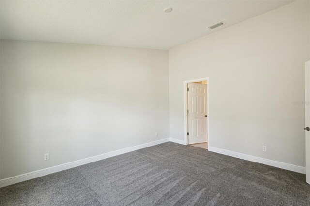 unfurnished room featuring carpet flooring