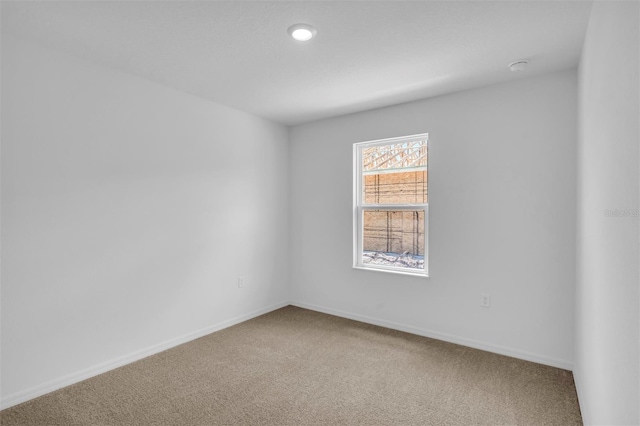 420 Marion Oaks Ln, Ocala, FL 34473 - carpeted empty room with baseboards and a smoke detector