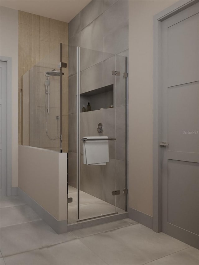 full bathroom with tile patterned flooring, a shower stall, and baseboards