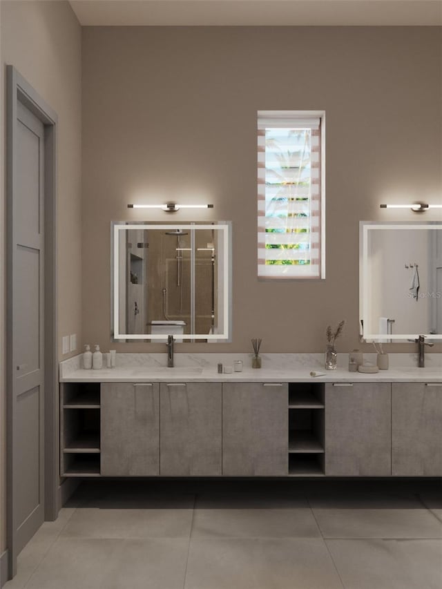 full bathroom featuring a stall shower, tile patterned flooring, and vanity