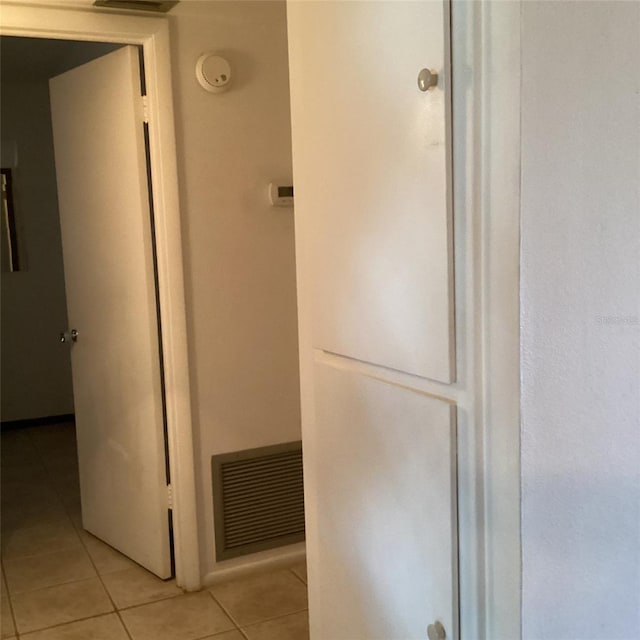 bathroom with tile patterned flooring