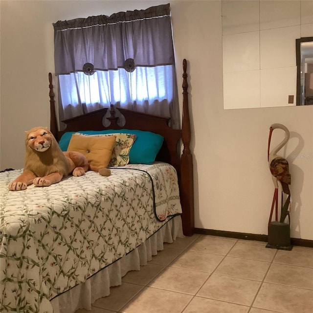 bedroom with tile patterned flooring