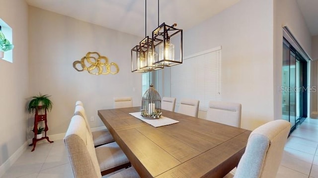 dining area with light tile patterned floors