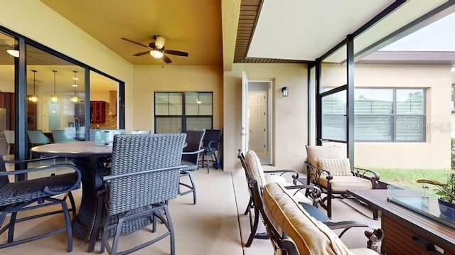 view of patio with ceiling fan and an outdoor living space