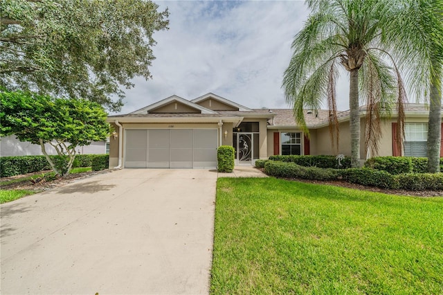 ranch-style house with a garage and a front lawn