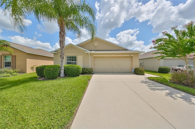 single story home featuring a garage and a front yard