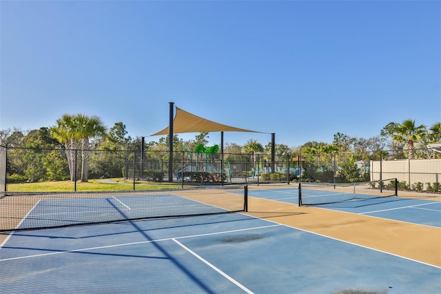 view of sport court with basketball hoop