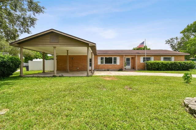 back of property featuring a yard