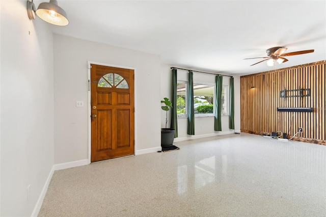 foyer featuring ceiling fan