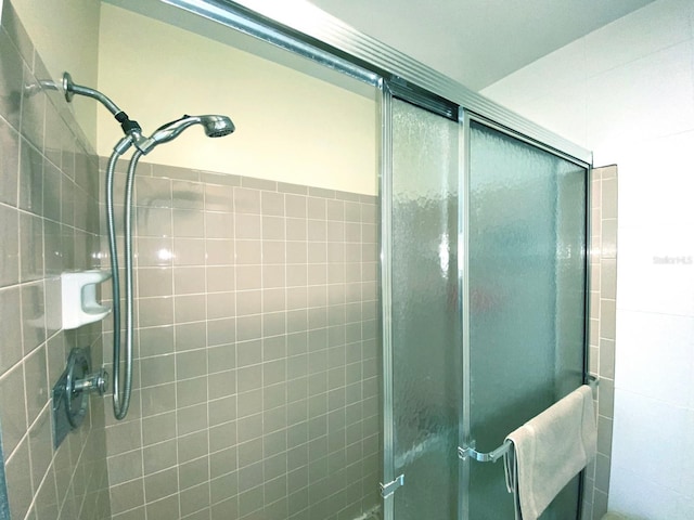 bathroom featuring an enclosed shower