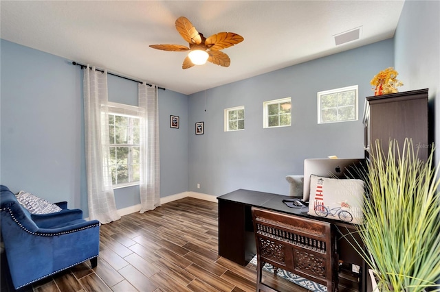 19300 Lonesome Pine Dr, Land O Lakes, FL 34638 - office featuring dark wood-type flooring, visible vents, ceiling fan, and baseboards
