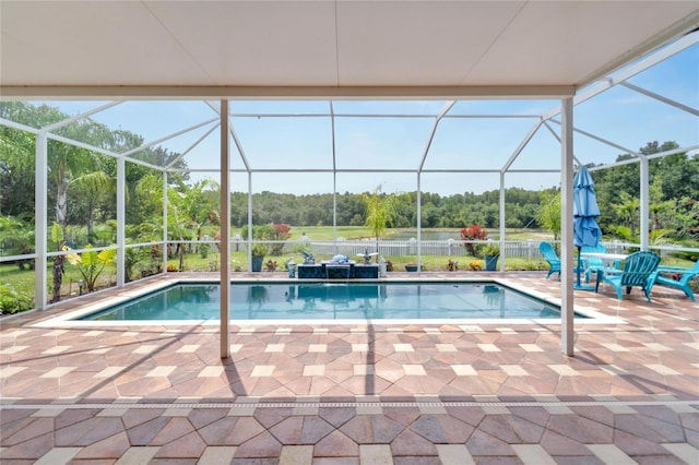 19300 Lonesome Pine Dr, Land O Lakes, FL 34638 - outdoor pool featuring glass enclosure, fence, and a patio